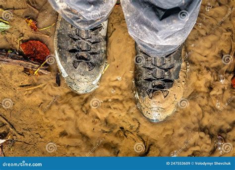 cleaning muddy shoes|shoe stuck in mud.